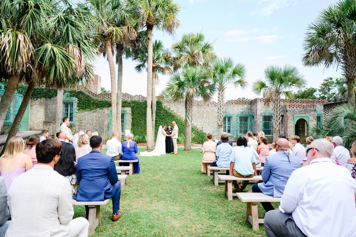 Ceremony in the courtyard at Atalaya Castle, Huntington Beach State Park wedding photography