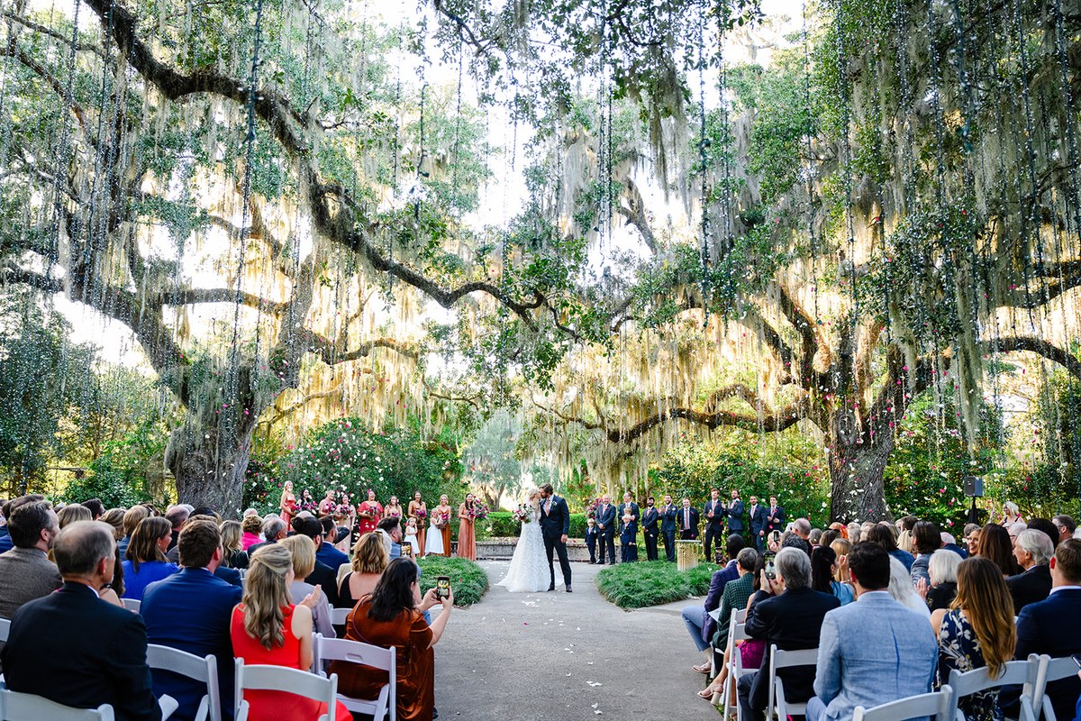 Ceremony under moss oaks at Brookgreen Gardens, Myrtle Beach wedding photography