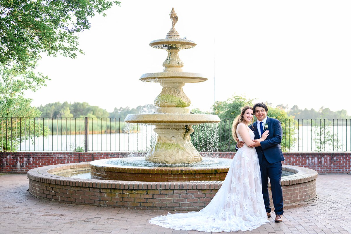 Couple at the fountain at Kaminski House in Georgetown, SC wedding photography